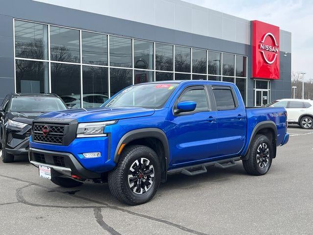 2024 Nissan Frontier Crew Cab 4x4 PRO-4X in Bluestone Pearl — front three-quarter view